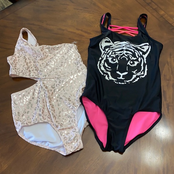 Used but great condition one piece bathing suits